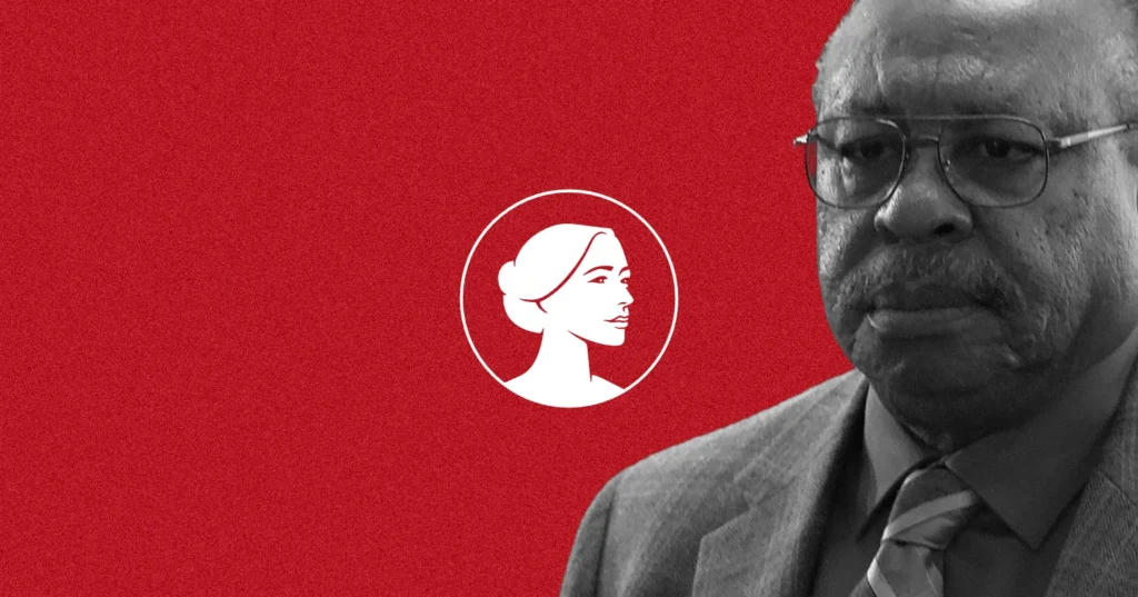 A man in a suit and tie stands on the right side of the image, looking serious. The red background and white circular logo evoke the unsettling atmosphere associated with Kermit Gosnell, the infamous abortionist behind the House of Horrors.