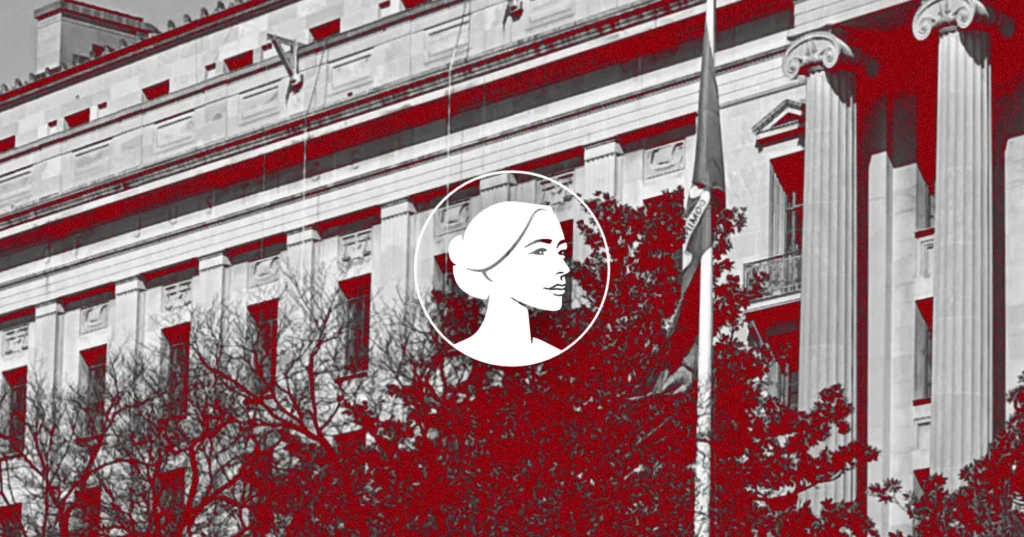 A grayscale building with columns and red-highlighted trees is shown, featuring a white profile illustration of a woman’s face. The scene subtly references the DOJ and its role in recent Abortion Drugs debates.