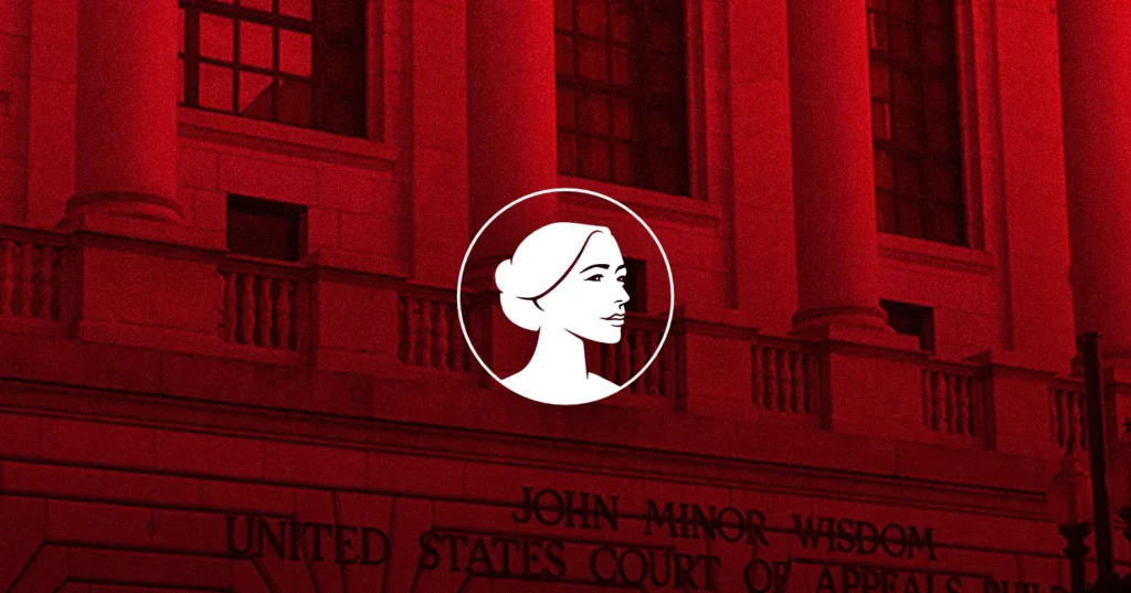 A stylized white profile of a woman’s face is centered over a red-tinted photo of the John Minor Wisdom United States Court of Appeals building, referencing the Federal Appeals Court’s role in recent Mail-Order Abortion Drug cases. Columns and part of the building’s name are visible.