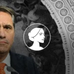 A man in a suit and orange tie sits in front of a microphone, with a grayscale illustration of a woman's profile and a textured, ornate architectural background on the right—capturing the formal atmosphere reminiscent of an AG Nominee during the Blanche Confirmation Hearing.