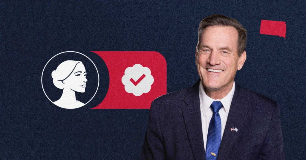 A smiling man in a suit stands in front of graphics: a woman’s profile, a checkmark in a circle, and a red shape of a U.S. state on a dark background—signifying SD Governor Larry Rhoden's pro-life stance.