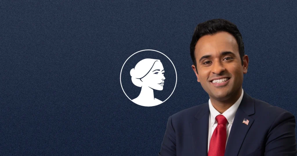 A man in a suit and red tie smiles in front of a navy background with a white profile illustration of a woman inside a circle, evoking the poised campaign style often seen in Ohio Governor and Pro-Life advocate Vivek Ramaswamy’s public appearances.
