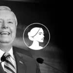 Smiling man in suit and tie stands at a podium with microphones. A white circle showing a woman's profile, associated with SBA Pro-Life America, is centered over the image. The background is dark and out of focus.