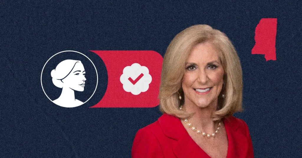 A woman with blonde hair in a red blazer and pearl necklace smiles in front of graphics showing a female profile, a checkmark, and a red Mississippi state outline on a dark blue background, highlighting Lynn Fitch’s pivotal role in the Pro-Life movement following the Dobbs Supreme Court decision.