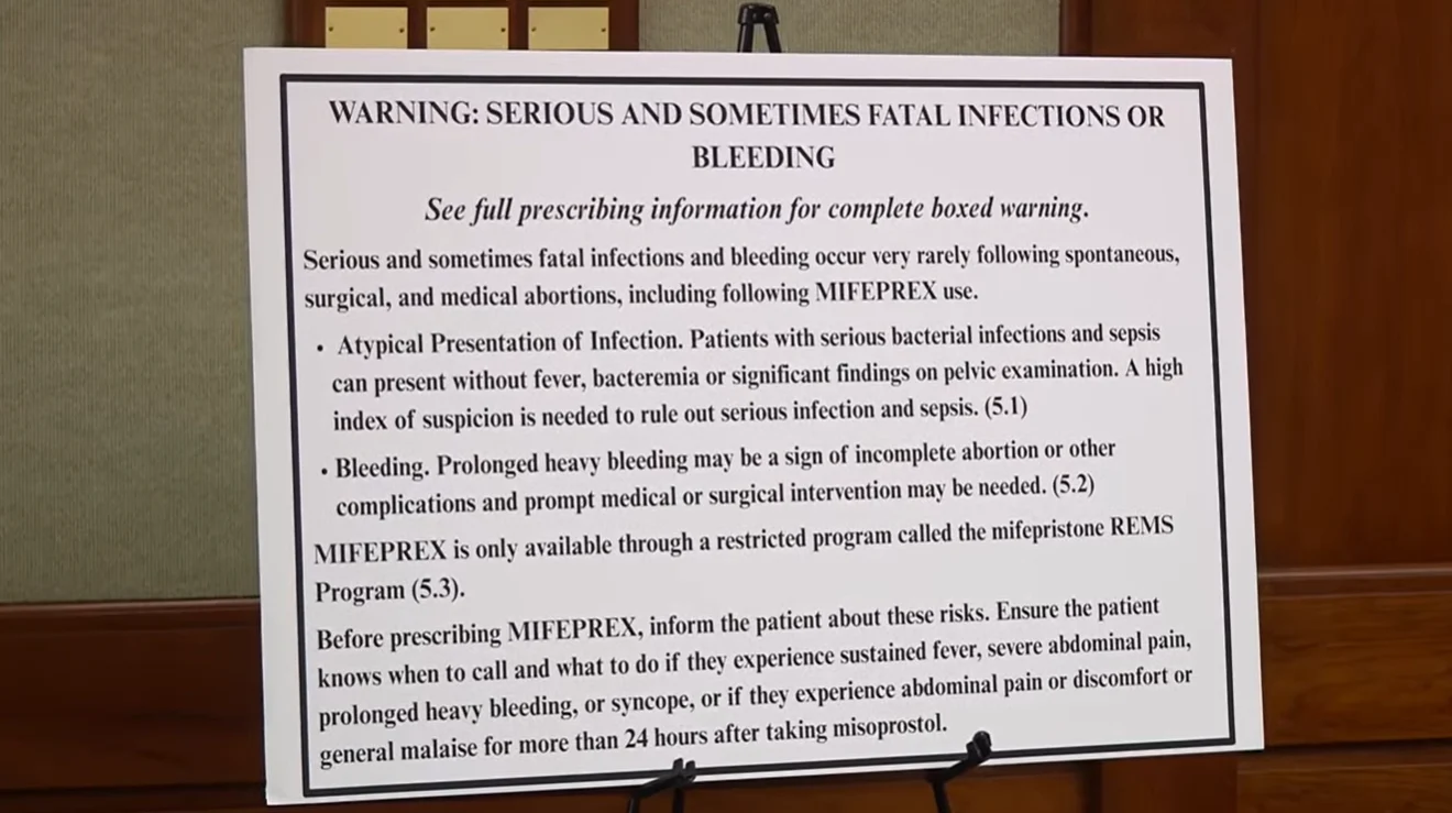 A poster titled WARNING: SERIOUS AND SOMETIMES FATAL INFECTIONS OR BLEEDING, providing medical safety information regarding Mifeprex, a medication central to ongoing abortion litigation.