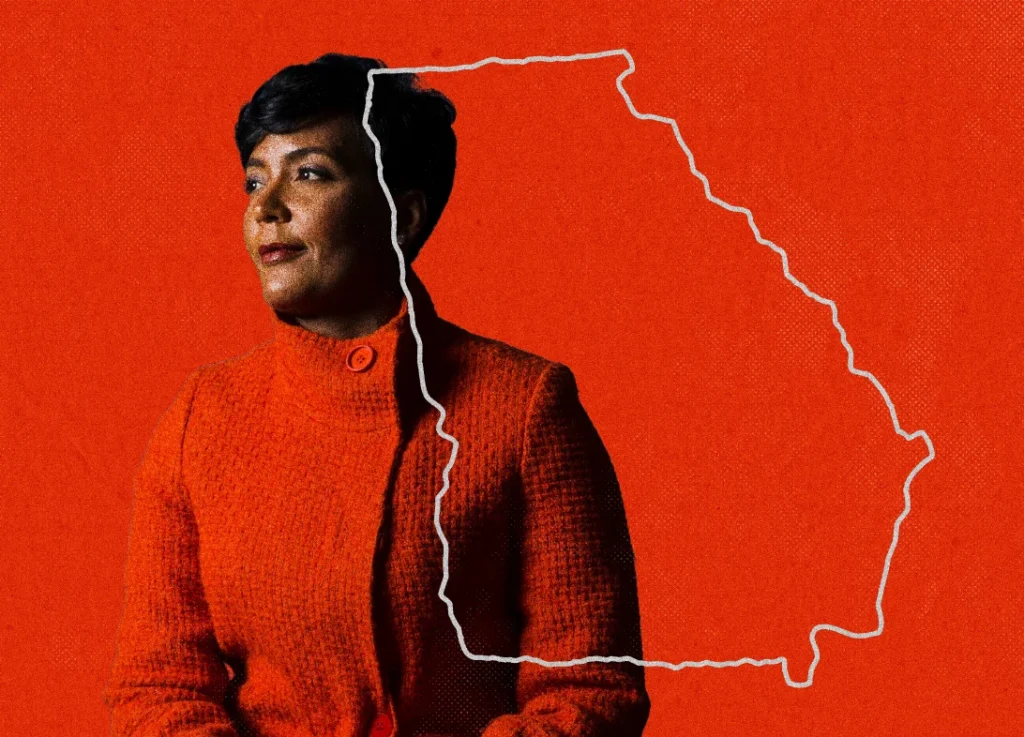 Keisha Lance Bottoms looks to the side against a bright orange background featuring a white outline of Georgia politics.
